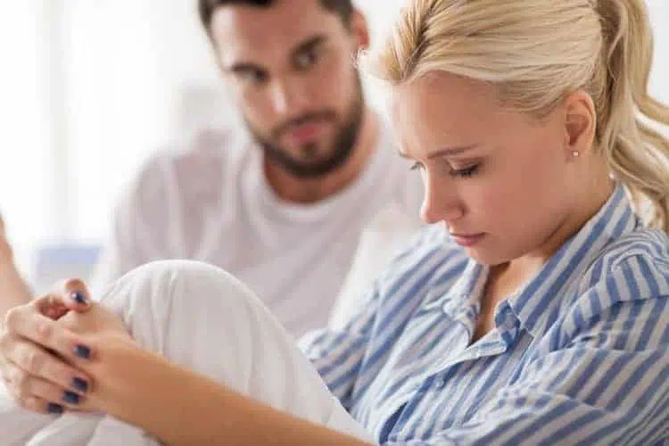 unhappy couple having conflict in bed at home P6WGD3H end a relationship