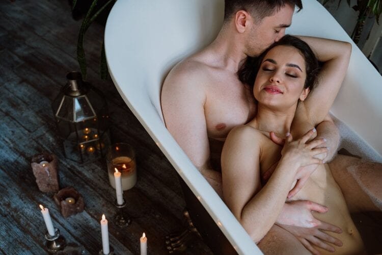 Date Night During the Quarantine: 5 Romantic Ideas to Keep the Spark Alive 4 couple in the tub BMUZ5H2 date night