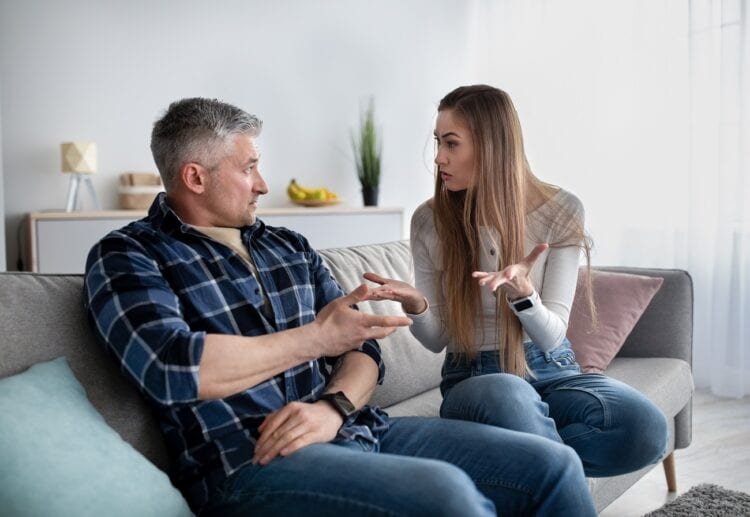 Frustrated mature couple quarreling at home, being angry, facing family problems. Senior Caucasian husband and his wife having conflict or disagreement. Marriage crisis, divorce concept