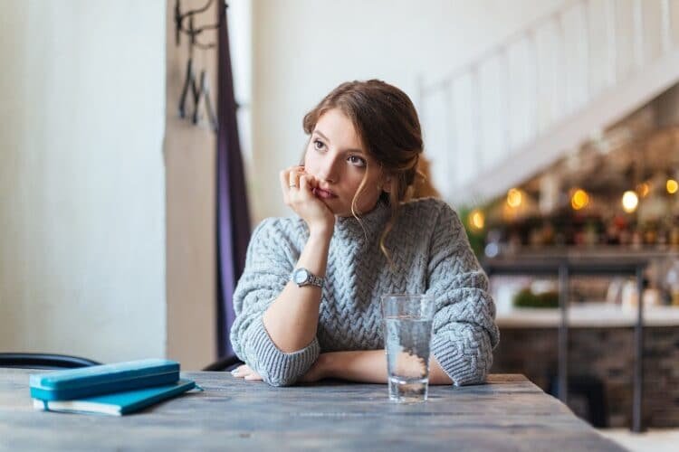 Woman waiting for somebody in cafe