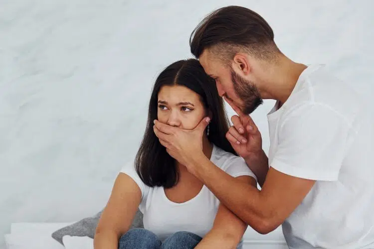 6 Insidious Dangers of Dealing With Emotional Manipulation In a Relationship 4 Be quiet. Violent aggressive young man threatening his girlfriend at home. Dealing with emotional manipulation.