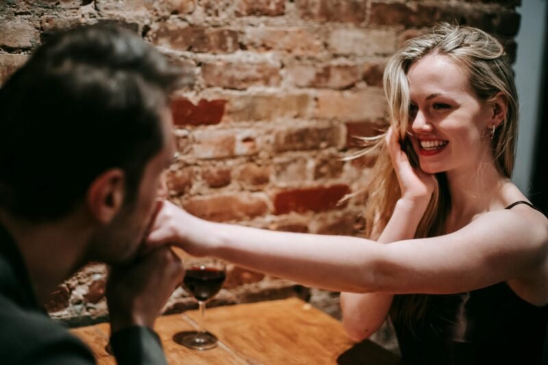 Happy couple enjoying romantic moment in cafe