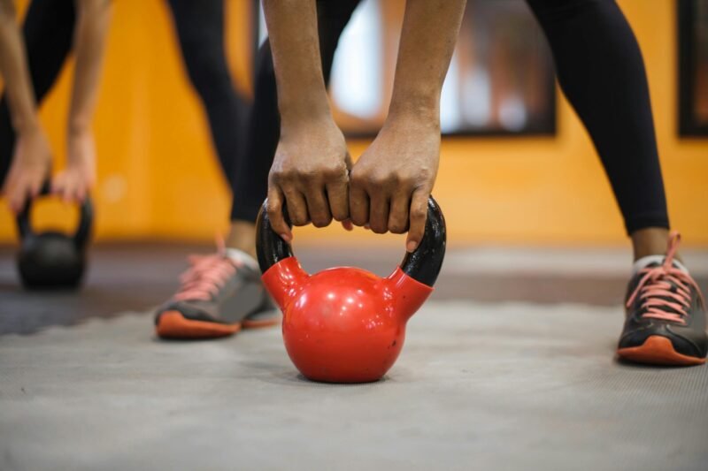 People holding a weights