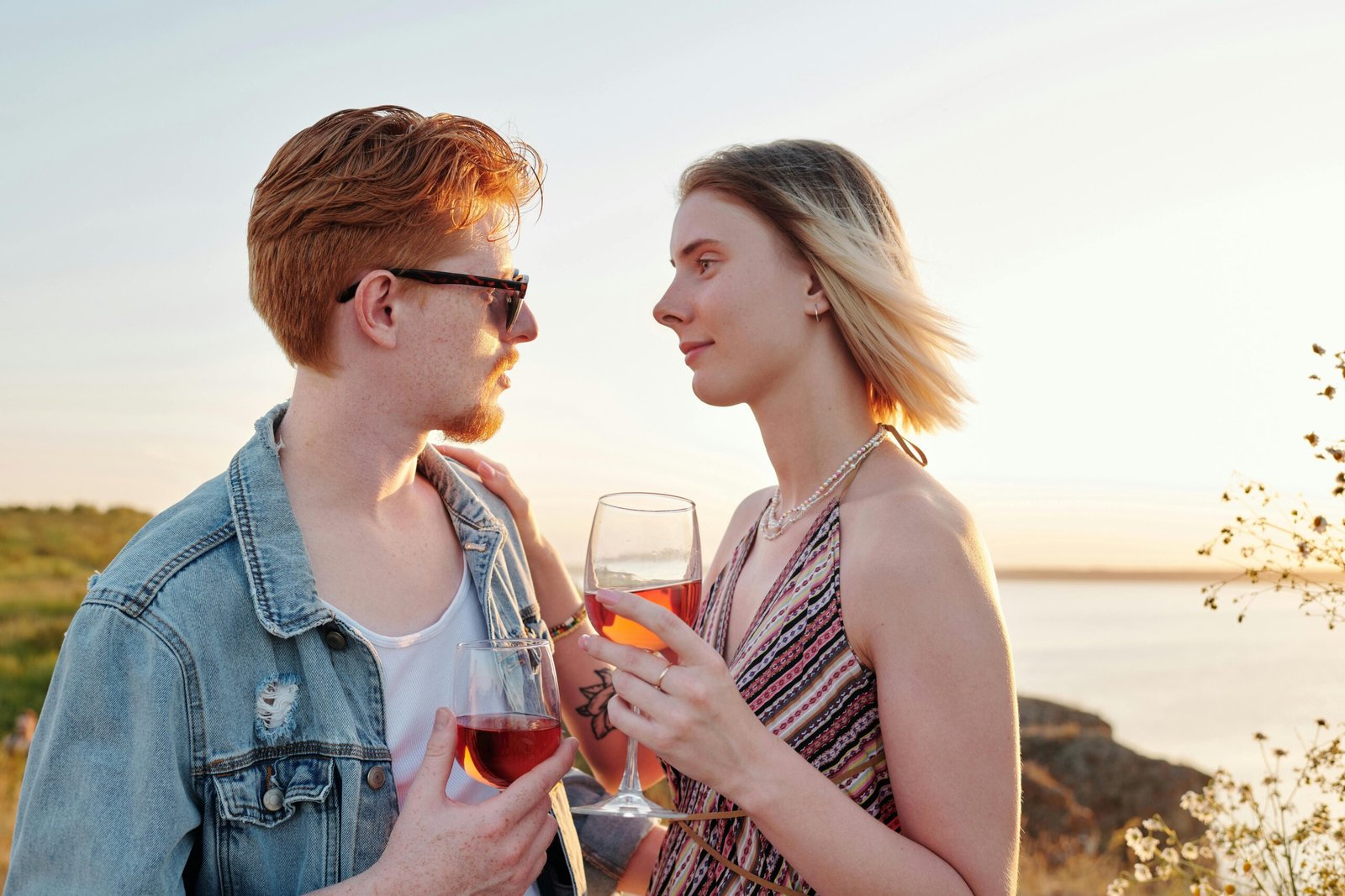 What Key Elements Make a Relationship Actually Work? 1 Couple holding wine glasses