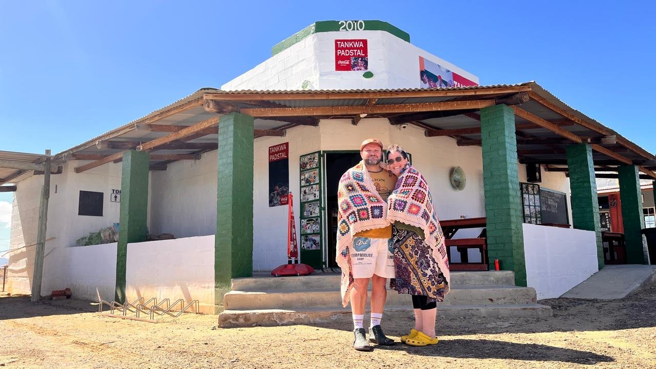 husband and wife in a blanket in the tankwa karoo
